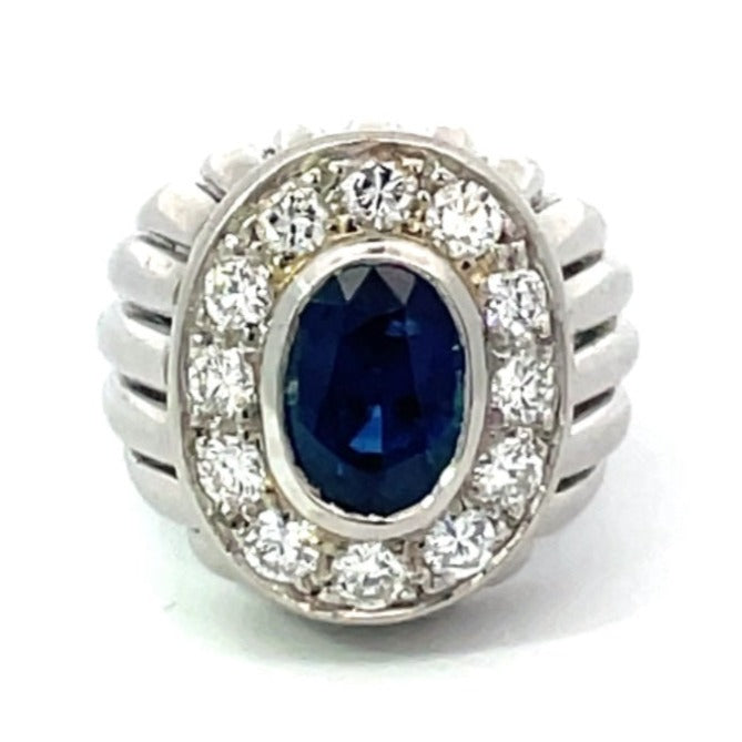 Front view of Vintage 1.93ct Oval Cut Natural Sapphire Dome Ring, Diamond Halo, Platinum
