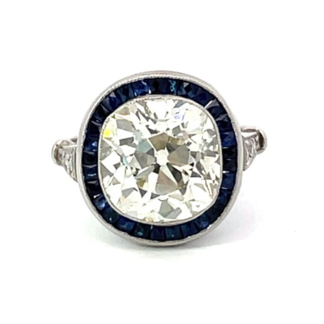 Front view of 5.15ct Antique Cushion Cut Diamond Engagement Ring, Sapphire Halo, Platinum
