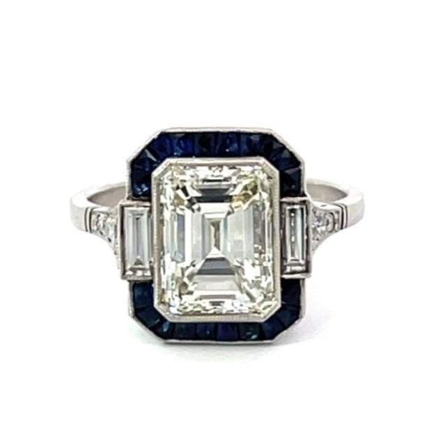 Front view of 3.05ct Emerald Cut Diamond Engagement Ring, VS1 Clarity, Sapphire Halo, Platinum