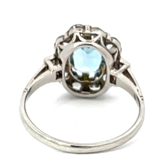 Front view of 1.20ct Oval Cut Natural Aquamarine Engagement Ring, Floral Diamond Halo, Platinum