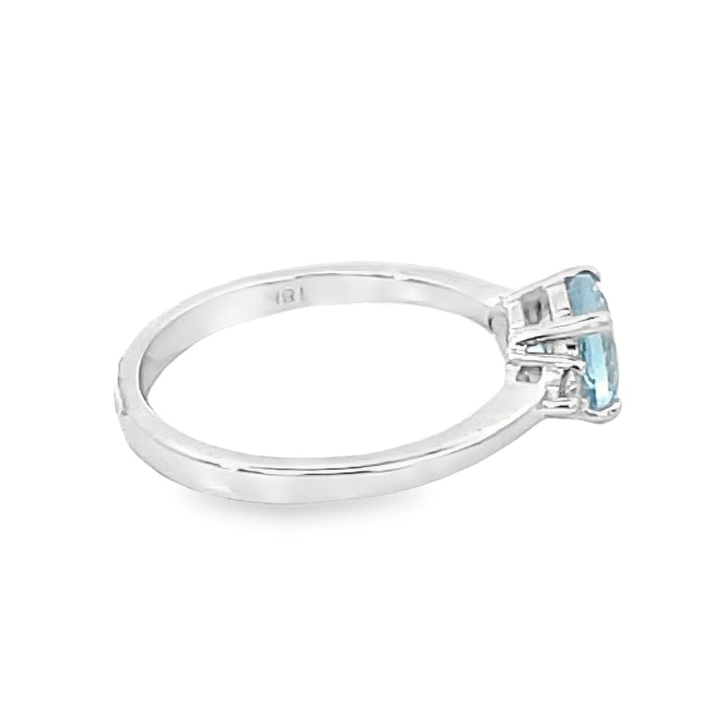 Side view of 1.10ct Round Cut Aquamarine Engagement Ring