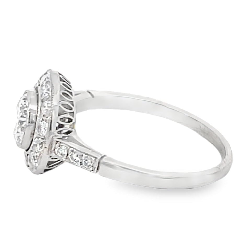 Side view of 0.65ct Round Brilliant Cut Diamond Engagement Ring, Diamond Halo, Platinum