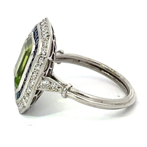 Side view of 3.77ct Emerald Cut Peridot Cocktail Ring, Diamond & Sapphire Halo, Platinum