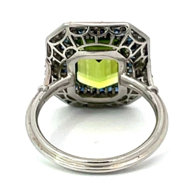 Back view of 3.77ct Emerald Cut Peridot Cocktail Ring, Diamond & Sapphire Halo, Platinum