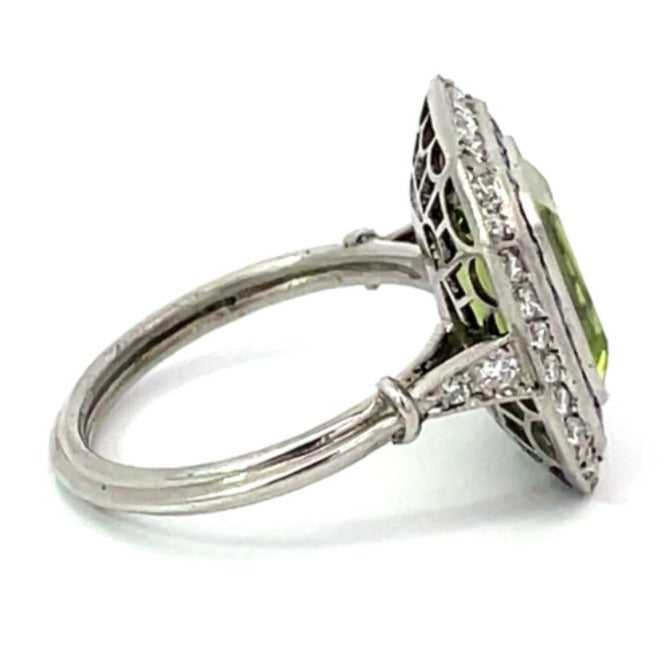 Side view of 3.77ct Emerald Cut Peridot Cocktail Ring, Diamond & Sapphire Halo, Platinum