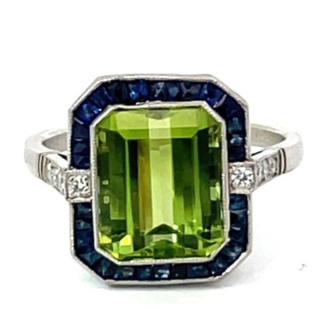 Front view of 3.72ct Emerald Cut Peridot Cocktail Ring, Sapphire Halo, Platinum