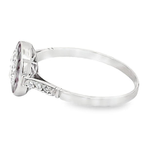 Side view of 0.74ct Round Brilliant Cut Diamond Engagement Ring, Ruby Halo, Platinum