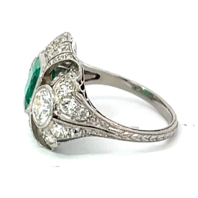 Side view of Antique 1.00ct Emerald Cut Columbian Emerald Engagement Ring, Platinum, Circa 1910