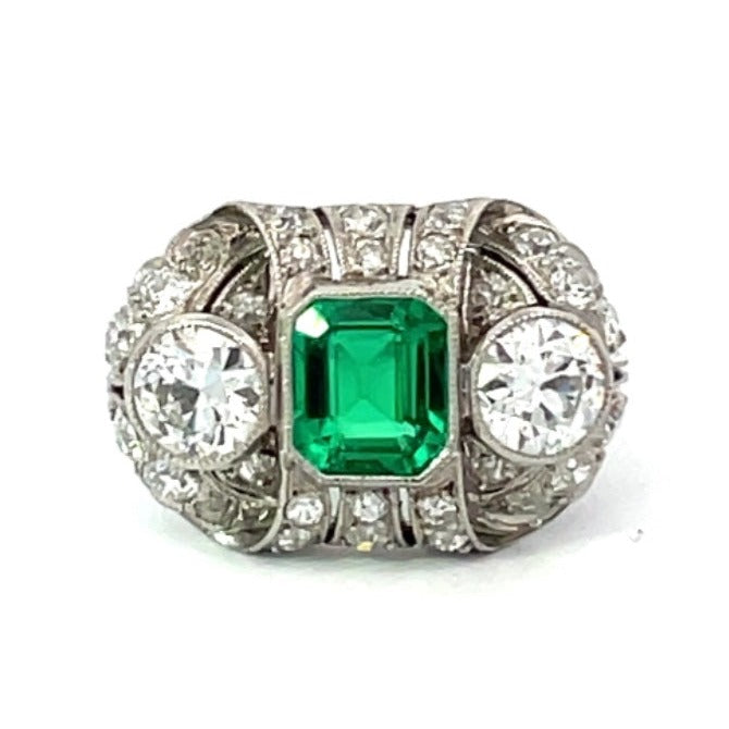 Front view of Antique 1.00ct Emerald Cut Columbian Emerald Engagement Ring, Platinum, Circa 1910
