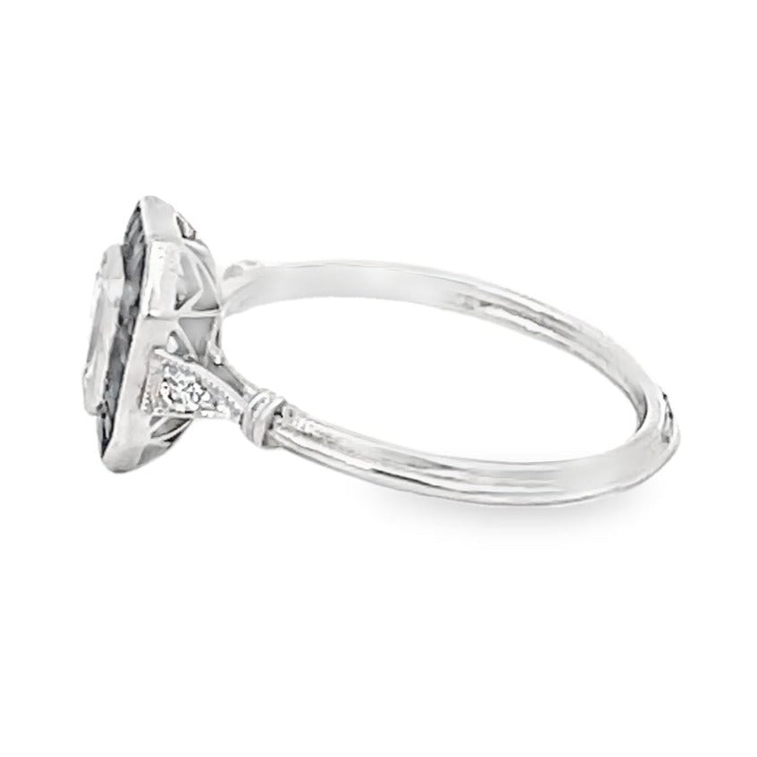 Side view of 0.52ct Emerald Cut Diamond Engagement Ring, VS1 Clarity, Sapphire Halo, Platinum