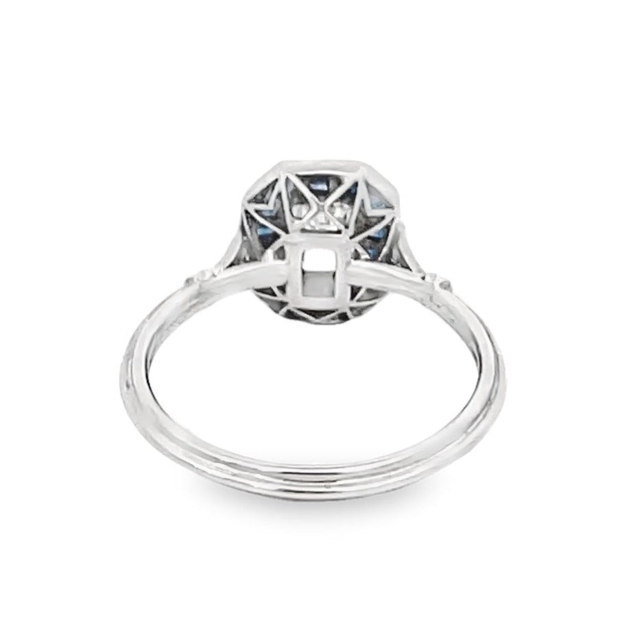 Back view of 0.52ct Emerald Cut Diamond Engagement Ring, VS1 Clarity, Sapphire Halo, Platinum