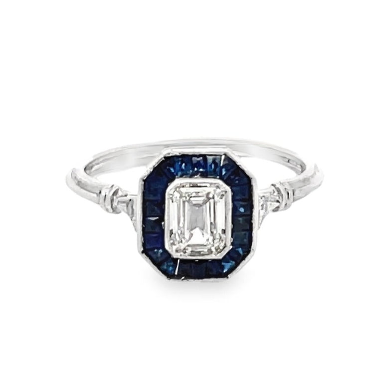 Front view of 0.52ct Emerald Cut Diamond Engagement Ring, VS1 Clarity, Sapphire Halo, Platinum