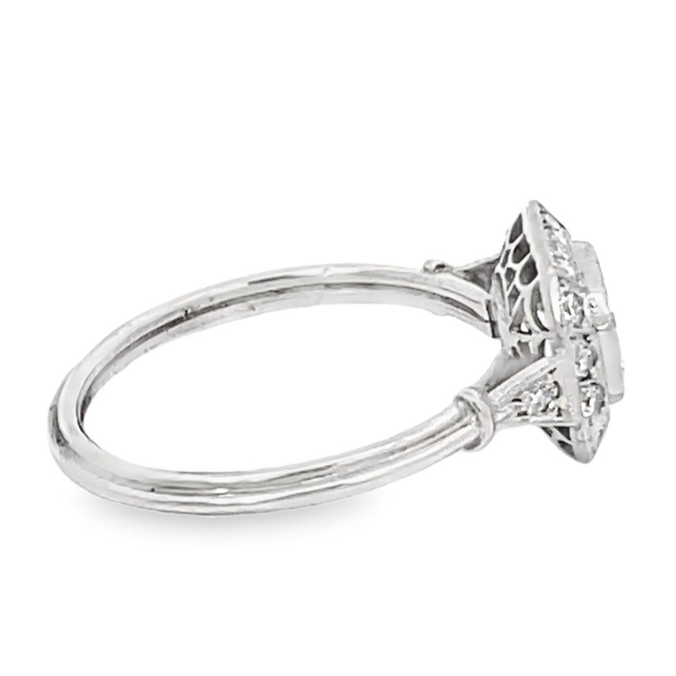 Side view of GIA 0.75ct Emerald Cut Diamond Engagement Ring, Diamond Halo, Platinum