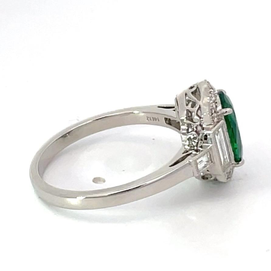 Side view of 1.72ct Oval Cut Natural Emerald Engagement Ring, Diamond Halo, Platinum