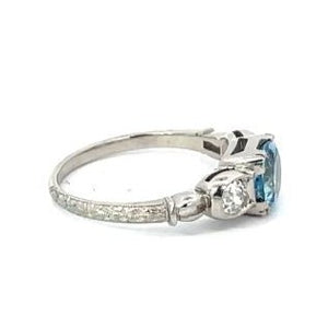 Side view of 0.86ct Round Cut Aquamarine Engagement Ring, Platinum