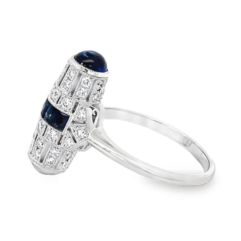 Side view of Barrel Shaped 0.63ct Diamond and 0.47ct Sapphire Cocktail Ring, Platinum