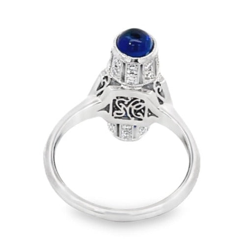 Front view of Barrel Shaped 0.63ct Diamond and 0.47ct Sapphire Cocktail Ring, Platinum