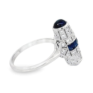 Side view of Barrel Shaped 0.63ct Diamond and 0.47ct Sapphire Cocktail Ring, Platinum