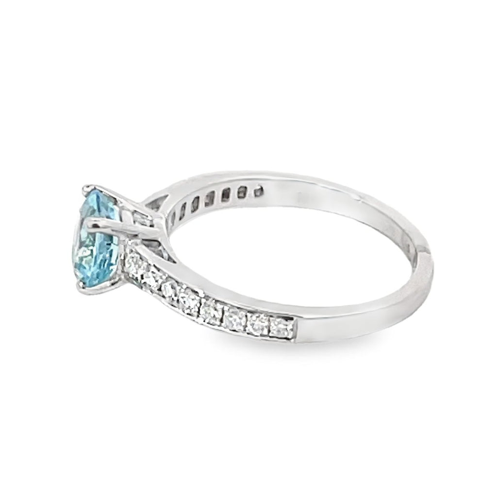 Side view of 1.06ct Round Cut Aquamarine Engagement Ring