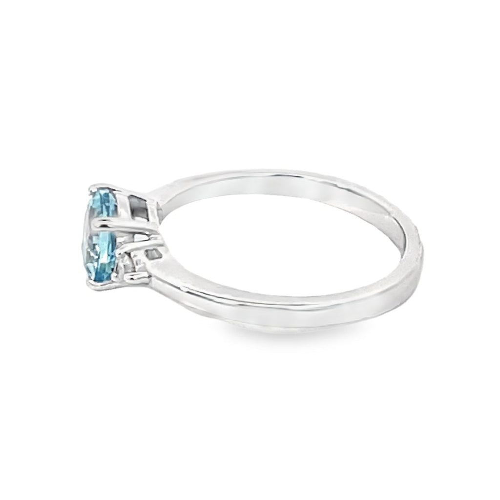 Side view of 1.10ct Round Cut Aquamarine Engagement Ring