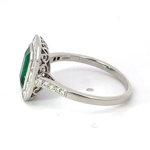 Side view of 1.54ct Emerald Cut Natural Green Emerald Engagement Ring, Diamond Halo, Platinum