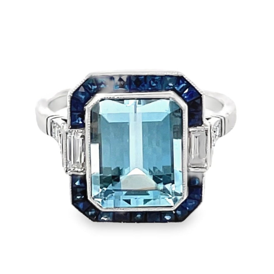 Front view of 3.40ct Emerald Cut Natural Aquamarine Cocktail Ring, Diamond & Sapphire Halo, Platinum