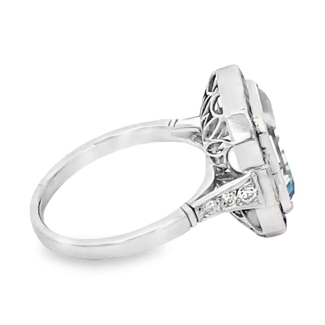 Side view of 3.40ct Emerald Cut Natural Aquamarine Cocktail Ring, Diamond & Sapphire Halo, Platinum