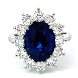 Front view of GIA 5.99ct Oval Cut Natural Sapphire Cluster Ring, Diamond Halo, Platinum