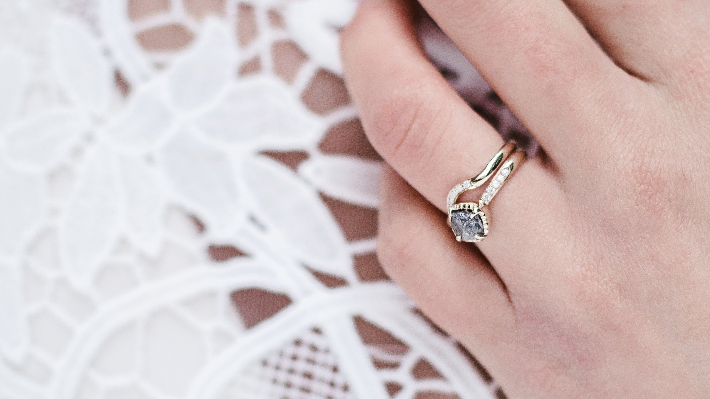 vintage engagement ring on finger