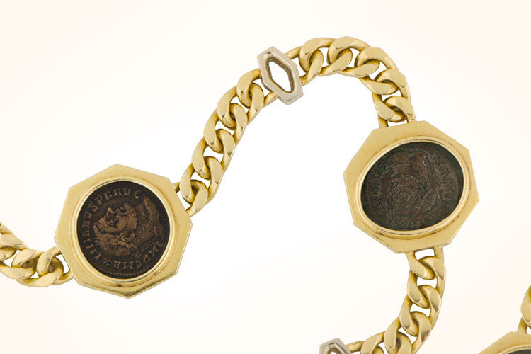 Sold at auction 18kt Gold and Ancient Coin 